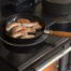 ESSE-Ironheart-sausages-on-hotplate